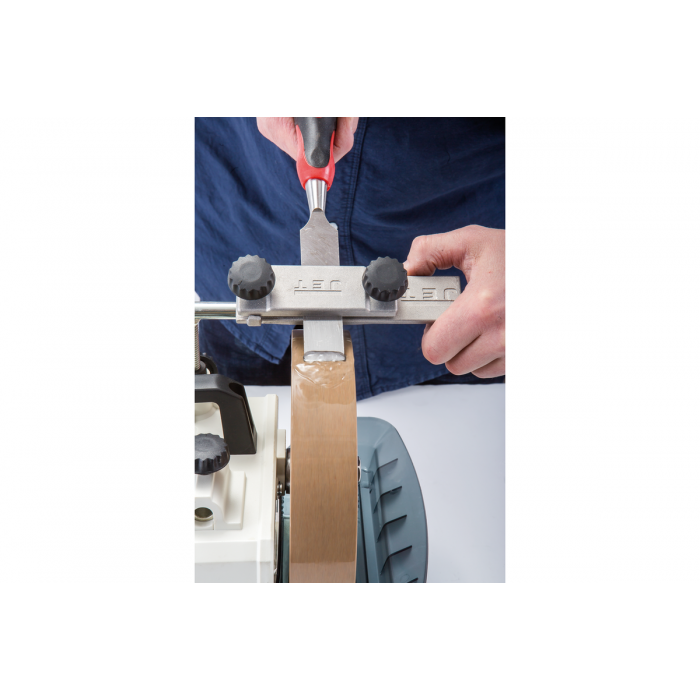 Пристосування для заточування ножів рубанків і столярного інструиенту для точильних верстатів